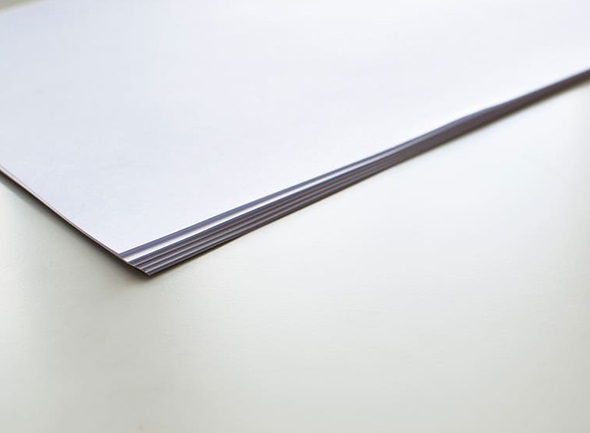 Stack of high-quality Bond Paper, suitable for professional documents and printing